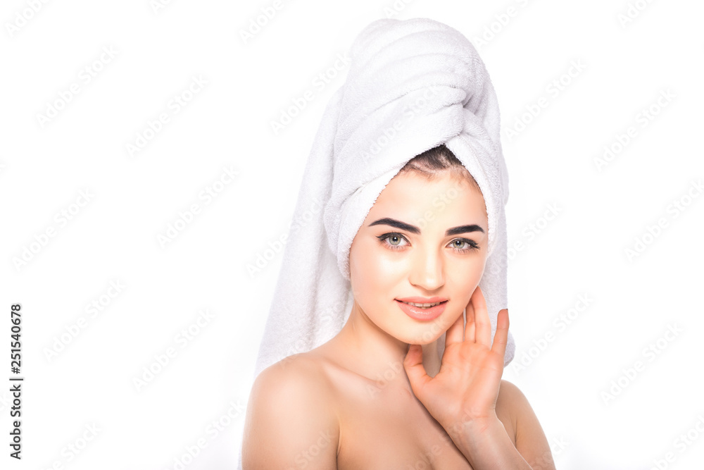 Spa skin care beauty woman wearing hair towel after beauty treatment. Beautiful young woman with perfect skin isolated on white background. Spa skin care beauty woman wearing hair towel after beauty treatment. Beautiful young woman with perfect skin isolated on white background.