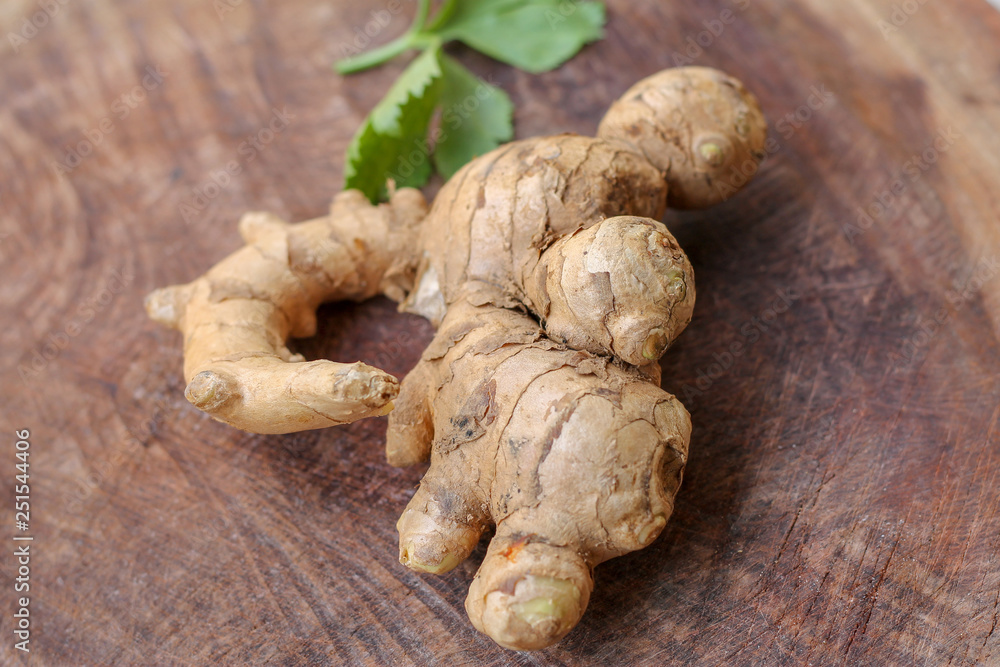 Ginger root  on wooden background