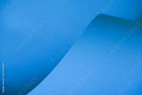 Abstraction of a design blue paper. Empty space on monochrome paper.