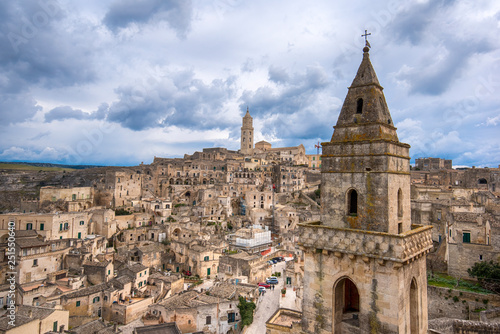 Matera, Basilicata, Italy, landscape at day of the old town (sassi di Matera), European Capital of Culture. Church San Pietro Barisano and duomo cathedral. Unseco World Heritage site © mitzo_bs
