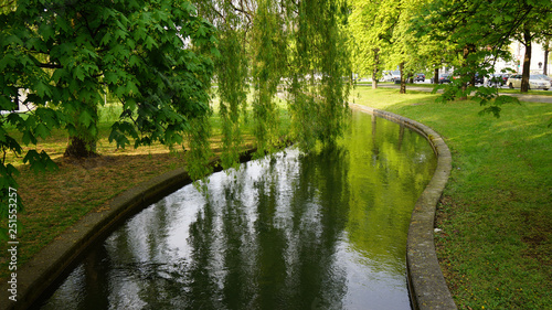 english garden river mirror munich bavaria red tree