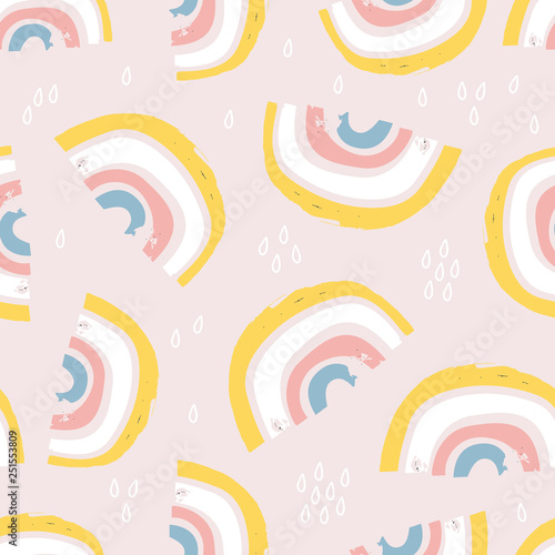Seamless childish pattern with hand drawn rainbows and drops, .Creative scandinavian kids texture for fabric, wrapping, textile, wallpaper, apparel. Vector illustration
