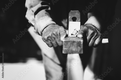 In the hands of a carpenter there is spokeshave.