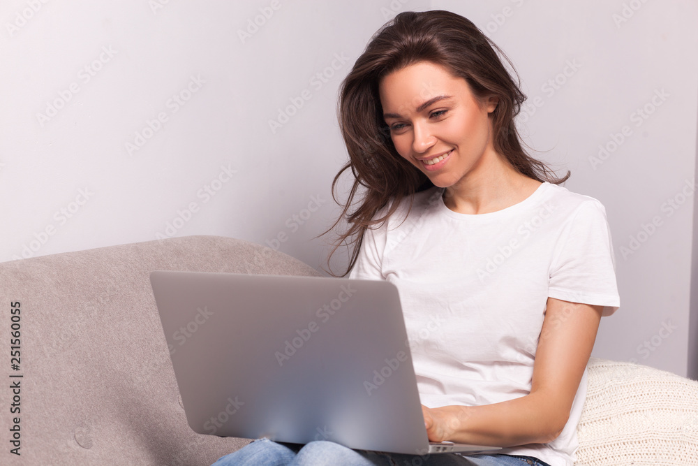 woman working on a laptop at home. woman working on a laptop at home.