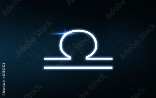 astrology and horoscope - libra sign of zodiac over dark night sky and stars background