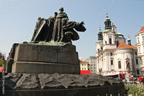Old statue and church in Prague, Czech Republic