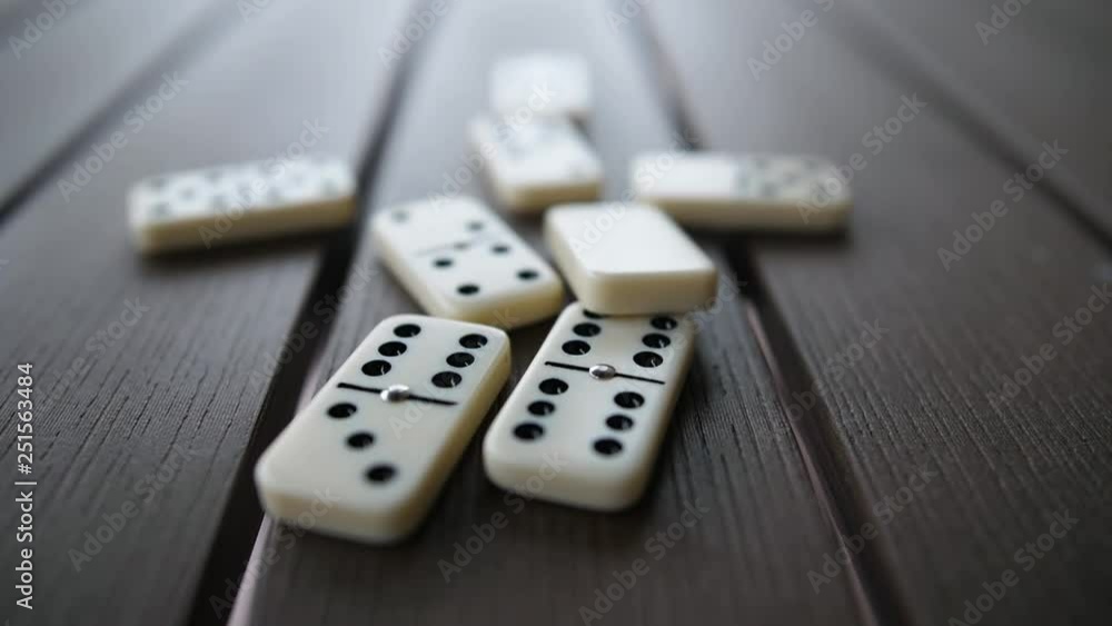 Falling Row of Domino Tiles in Slow Motion Falling Row of Domino Tiles in Slow Motion