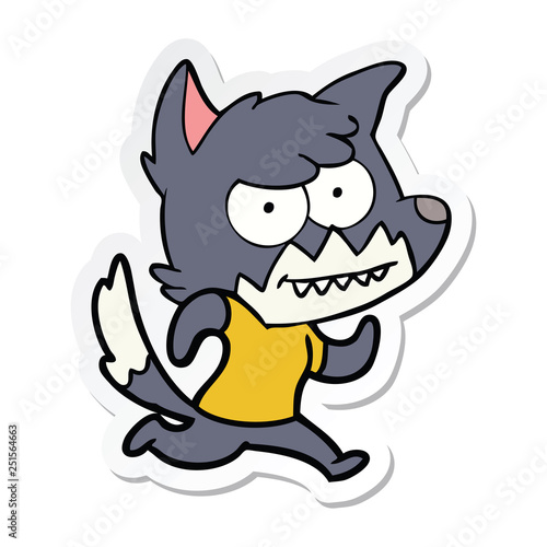 sticker of a cartoon grinning fox