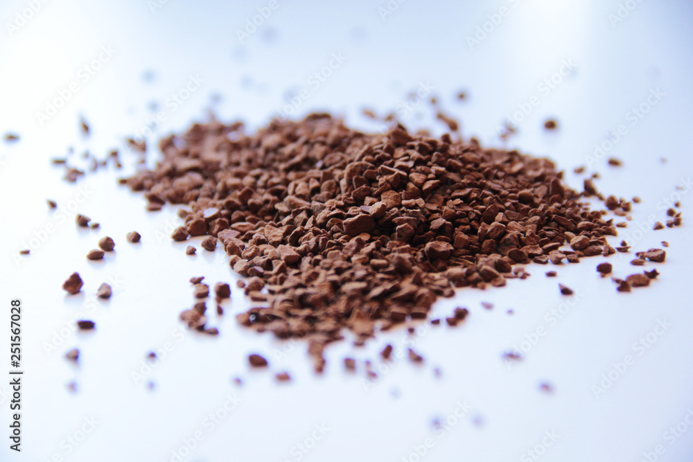 Coffee granules on a light background Coffee granules on a light background