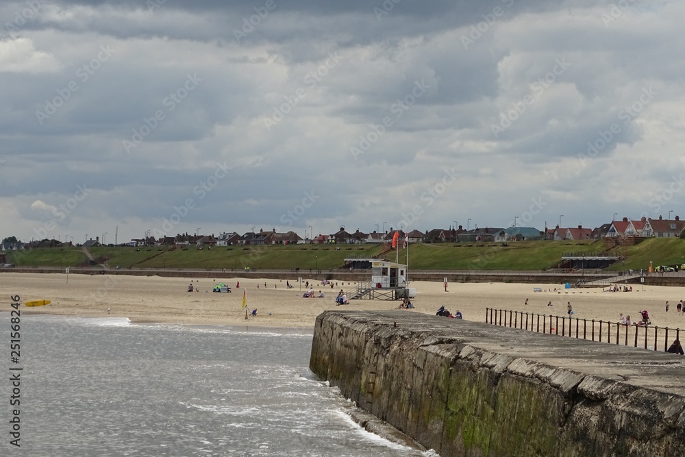 Cloudy grey skies over Gorleston beach, Norfolk, England, UK Cloudy grey skies over Gorleston beach, Norfolk, England, UK