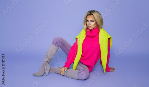 Foto Fashion Model girl full length portrait isolated on blue background