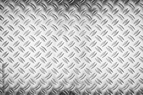 shiny polished aluminum diamond plate metal texture background empty with copy space design pattern background