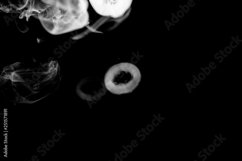 white circle smoke, abstract powder, water spray. isolated on black background. 