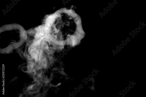 white circle smoke, abstract powder, water spray. isolated on black background. 