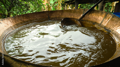 Obraz na plátne Large tacho of boiling molasses the main ingredient of the rapadura