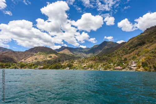 Fototapeta Naklejka Na Ścianę i Meble -  Shore of Santa Cruz la Laguna at Lake Atitlan in vulcano landscape of Guatemala