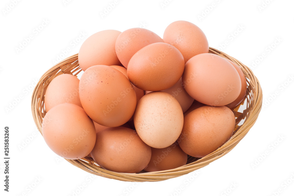 Chicken eggs in basket on isolated white background. Chicken eggs in basket on isolated white background.