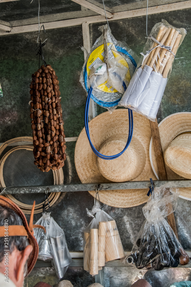 old boots and hats on a market