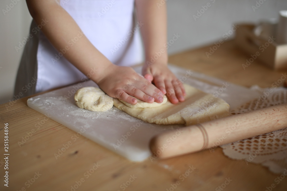 hands making dough cakes, pizza in the kitchen