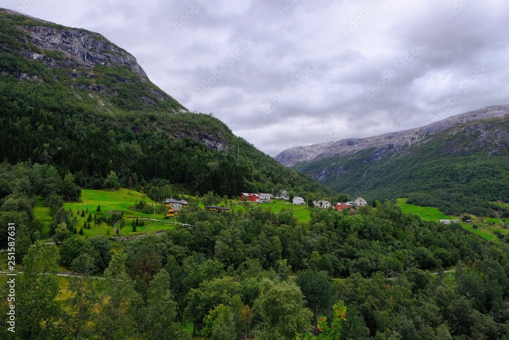 Beautiful view on Naeroydalen Valley and Peaks On Stalheim, Voss Norway. Little village with colorful houses.