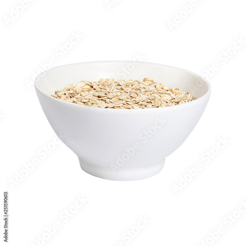 A bowl with oat-flakes isolated on white background.