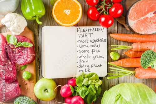 Flexitarian diet diet, with fresh vegetables, raw meat and fish, legumes, grains, fruit, wooden background, copy space top view photo