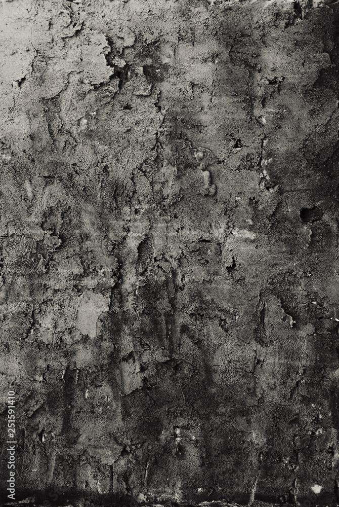 vertical background of old uneven dark gray plaster vertical background of old uneven dark gray plaster