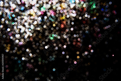 Glitter wonderful lights background.Abstract dark glitter lights texture or background.