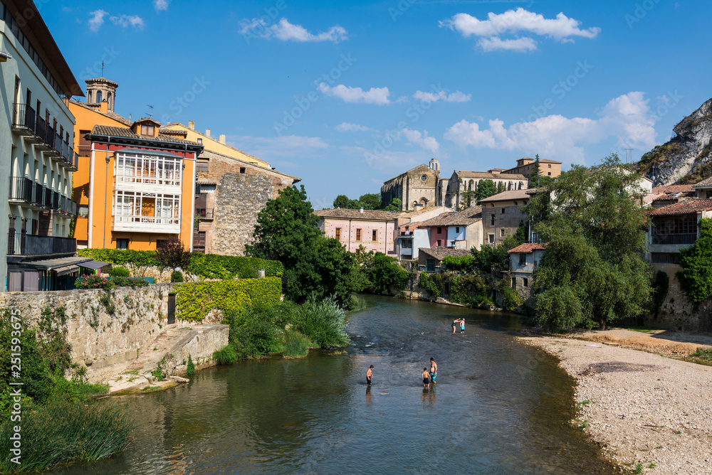 People cooling off in Ega river, Estella or Lizarra, Navarre region, Northern Spain