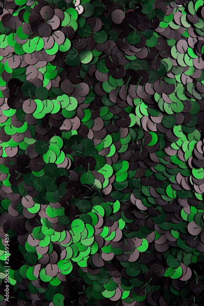 Fabric with sequins and sequins of bright colors. Fashion glitter fabric, sequins. Shiny surface Fabric with sequins and sequins of bright colors. Fashion glitter fabric, sequins. Shiny surface