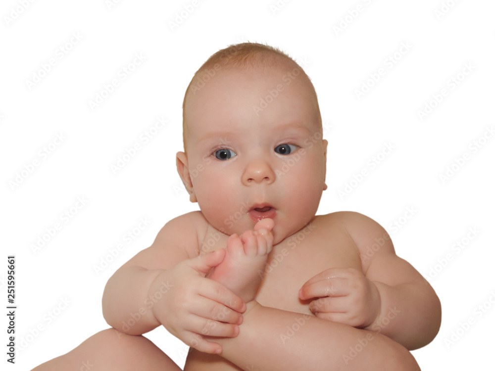 Little baby girl baby walks naked on her back. The baby takes sun and air baths and is skinned. She is trying to taste her toes. Little baby girl baby walks naked on her back. The baby takes sun and air baths and is skinned. She is trying to taste her toes.