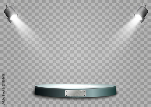  The spotlight shines on the stage.Llight from a lamp or spotlight. Lighted scene. Podium under the spotlight.