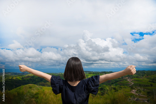 Happy young cute Asian Japanese girl hipster backpack women travelling looking at beautiful sky mountains scenery views 
