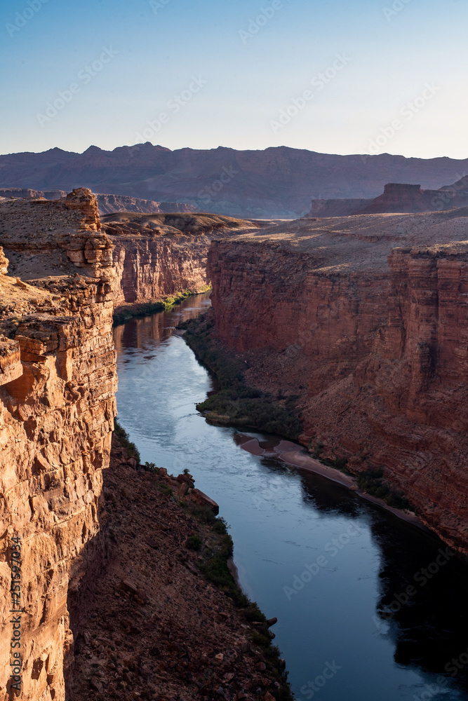 The Colorado river running through a section of Glen Canoyon near Navajo Bridge in Arizona. Portrait image.