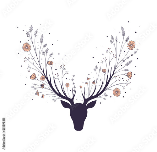 Flowers in the horns of a deer. Silhouette of the head of a forest animal.