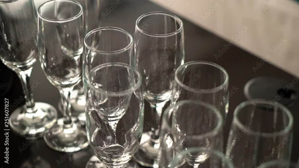 Empty glasses at table ready for party and drinks Empty glasses at table ready for party and drinks