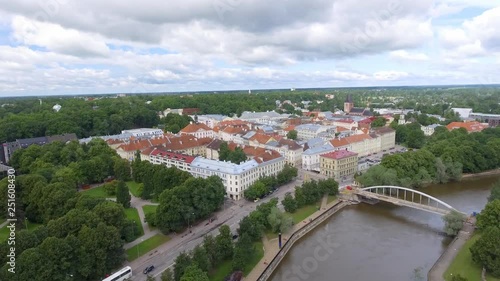 Aerial view of Tartu, Estonia. City river and skyline, going down from the sky photo