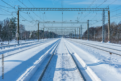 Electric railway lines at winter day time.