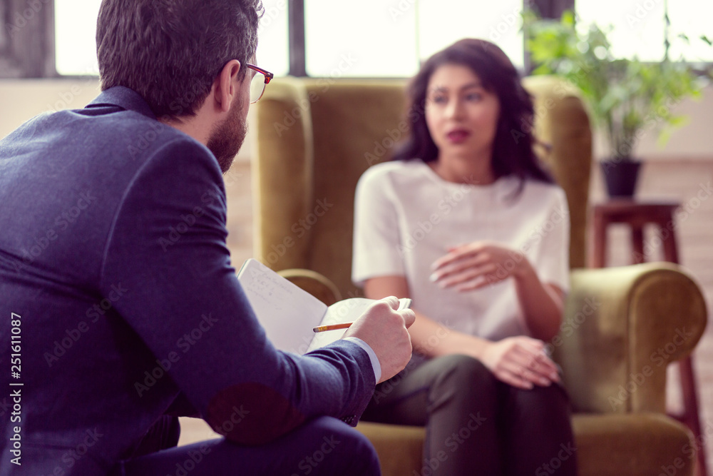 Selective focus of a smart experienced psychologist Selective focus of a smart experienced psychologist