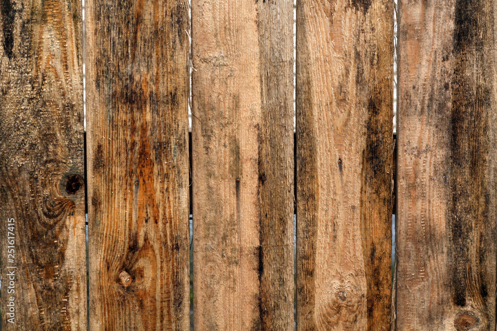 Naklejka premium Brown color old grunge wooden fence pattern.