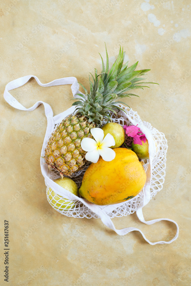 Pineapple Papaya in Eco String Bag Top Down View Pineapple Papaya in Eco String Bag Top Down View