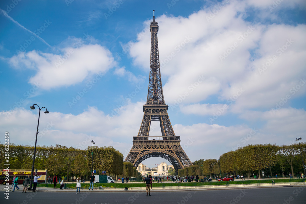 Fototapeta premium PARIS, FRANCE - 02 OCTOBER 2018: Eiffel tower, symbol of Paris , captured from champs de Mars