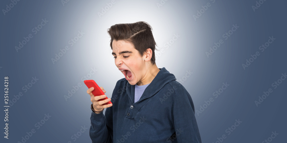 angry young man with isolated mobile phone on background angry young man with isolated mobile phone on background