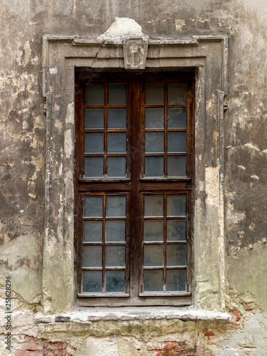 Windows on the facade of houses in the old city