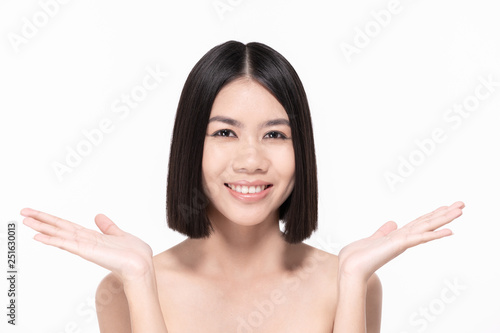 The concept of healthy beautiful woman. Beautiful women take care of skin health. Beautiful girl on white background.