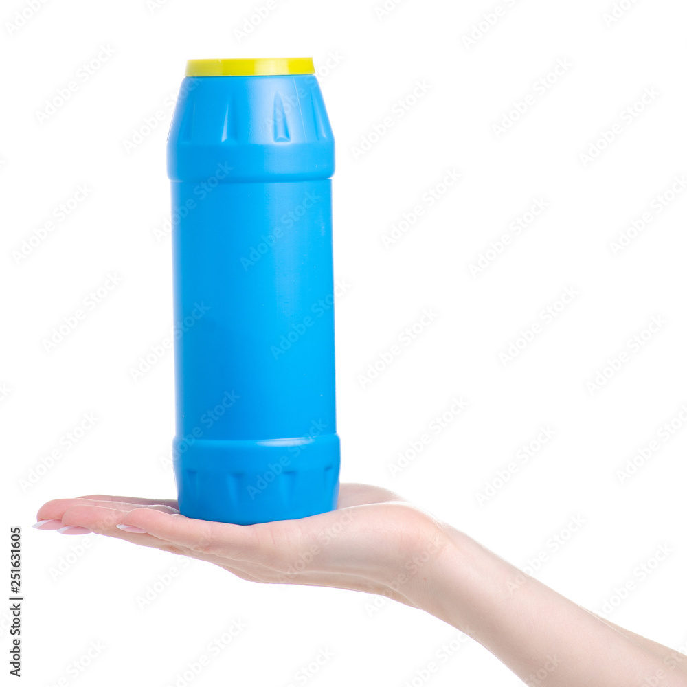 Blue bottle detergent powder in hand on white background isolation Blue bottle detergent powder in hand on white background isolation