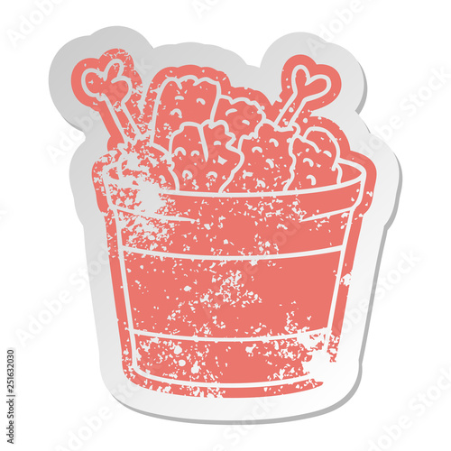 distressed old sticker bucket of fried chicken