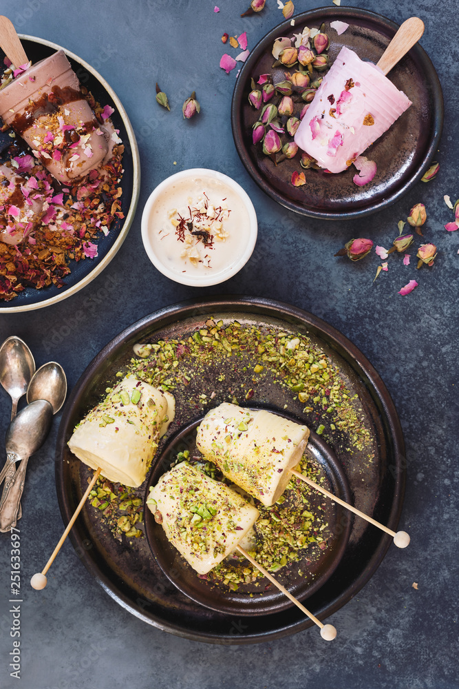 Assorted kulfi, Indian ice cream in different colors and flavors, top ...