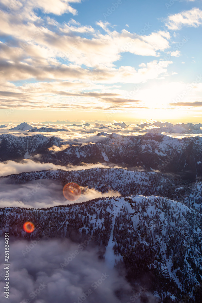 Aerial view of a beautiful Canadian Landscape during a winter sunset. Taken north of Vancouver, British Columbia, Canada.