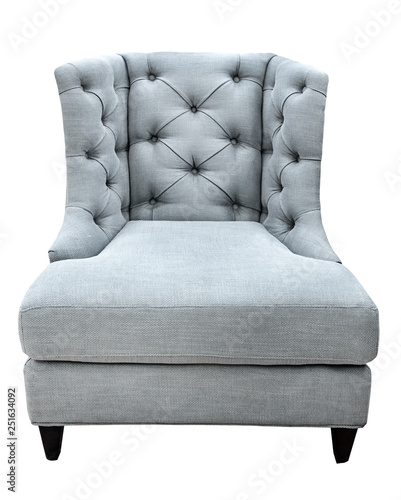 Gray classical vintage modern style armchair with fabric upholstery isolated on white background. Cozy fabric chair front view photo